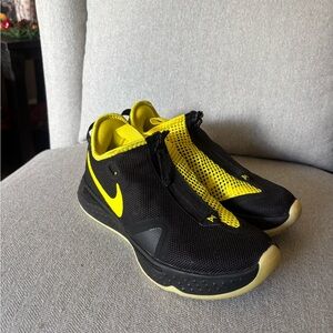Nike Basketball shoes 

Nike Black and Neon Yellow Athletic Shoes